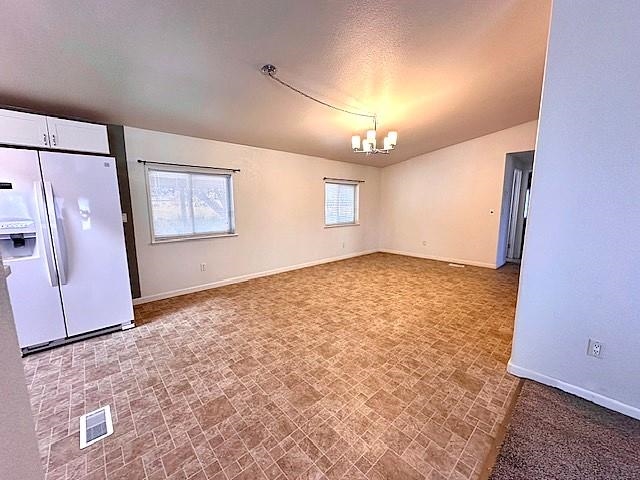 875 20 Road Fruita, CO 81521 - Photo 16 of 40 an empty room with windows
