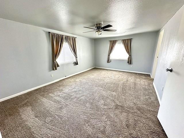 875 20 Road Fruita, CO 81521 - Photo 18 of 40 an empty room with windows and cabinet