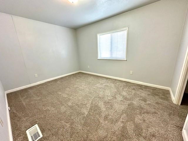 875 20 Road Fruita, CO 81521 - Photo 23 of 40 an empty room with windows