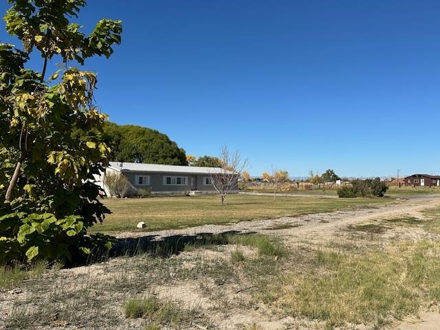 875 20 Road Fruita, CO 81521 - Photo 6 of 40 a view of a yard with an outdoor space