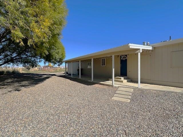 875 20 Road Fruita, CO 81521 - Photo 7 of 40 a view of a house with a patio