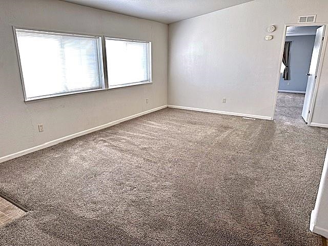 875 20 Road Fruita, CO 81521 - Photo 10 of 40 an empty room with a window