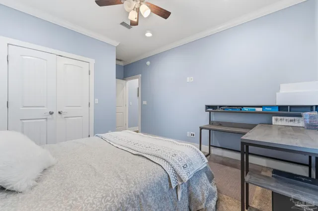 a living room with furniture kitchen view and a couch