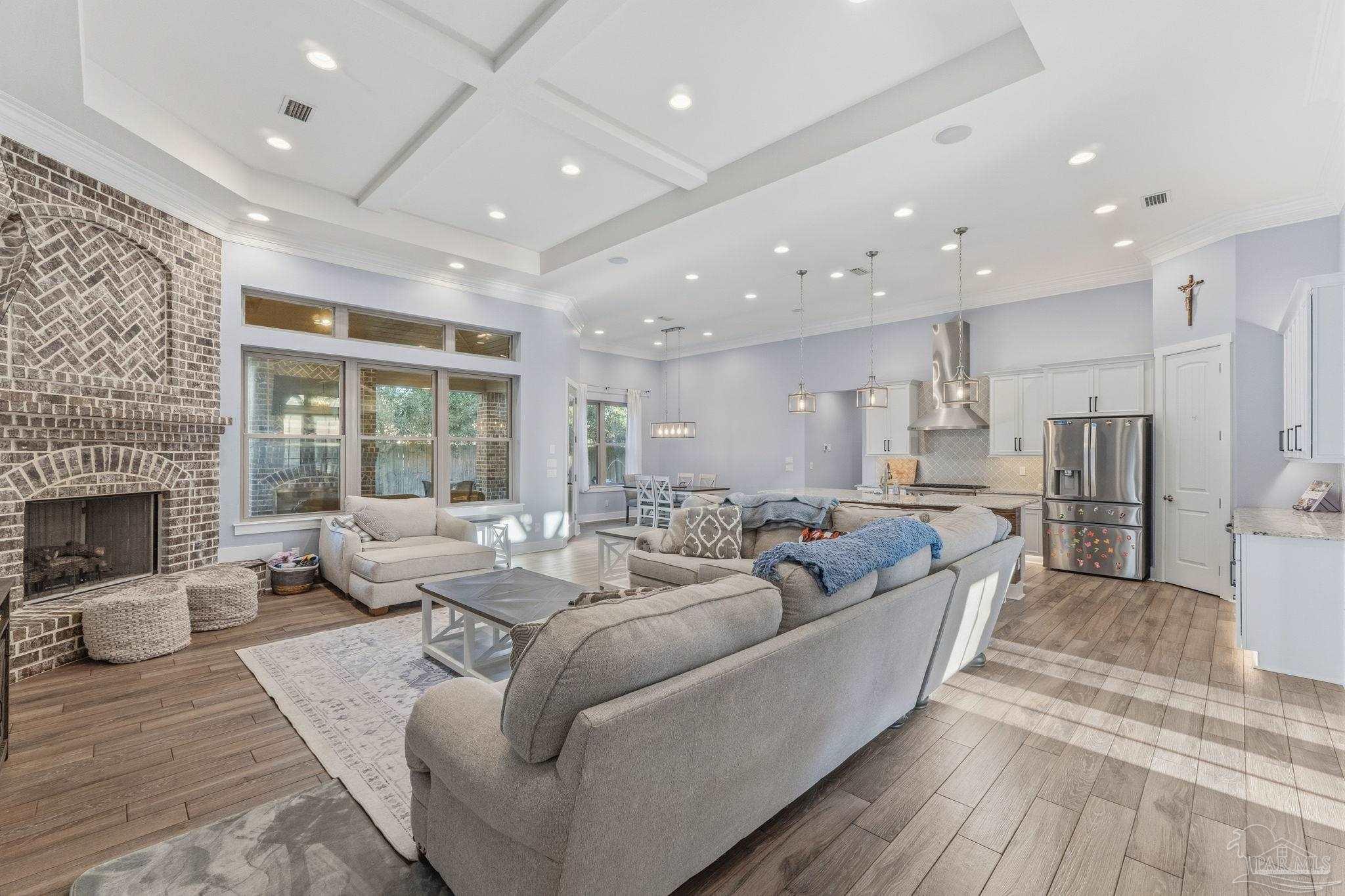 2018 Rambling Oaks Drive Cantonment, FL 32533 - Photo 16 of 64 a living room with furniture and a fireplace