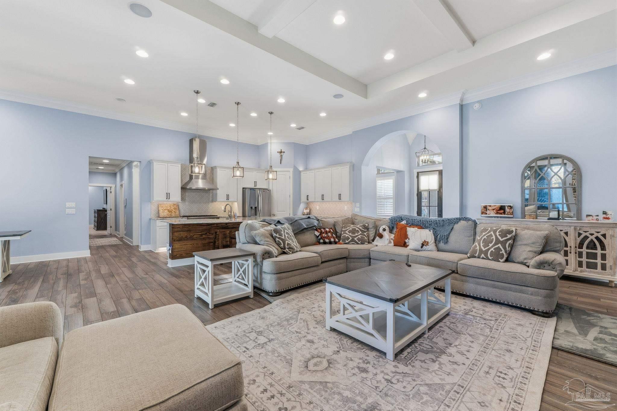 2018 Rambling Oaks Drive Cantonment, FL 32533 - Photo 19 of 64 a living room with furniture kitchen view and a couch