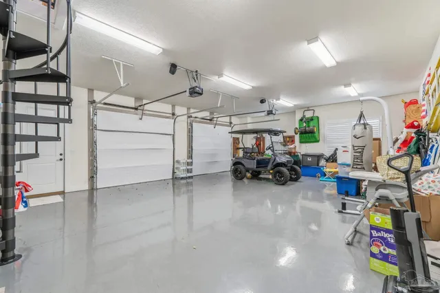 an aerial view of a house with a lake view