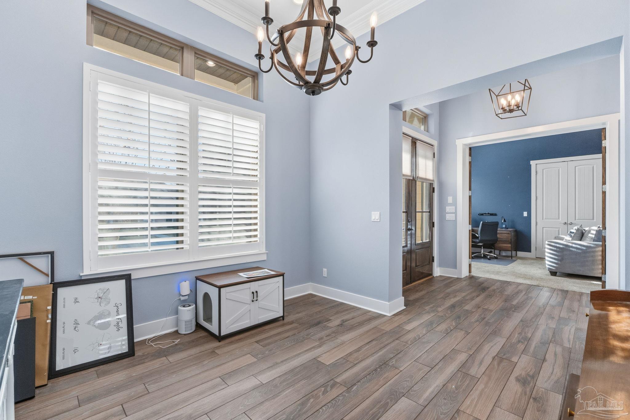 2018 Rambling Oaks Drive Cantonment, FL 32533 - Photo 8 of 64 a view of a livingroom with furniture and a window