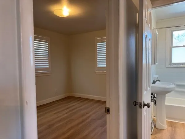 a view of a room that has a window in it