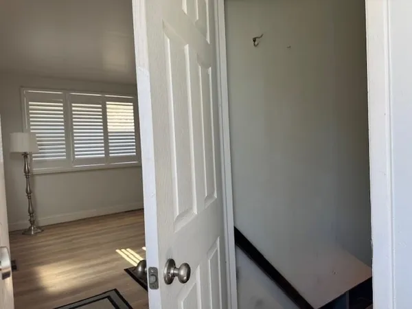 a view of a hallway with entryway