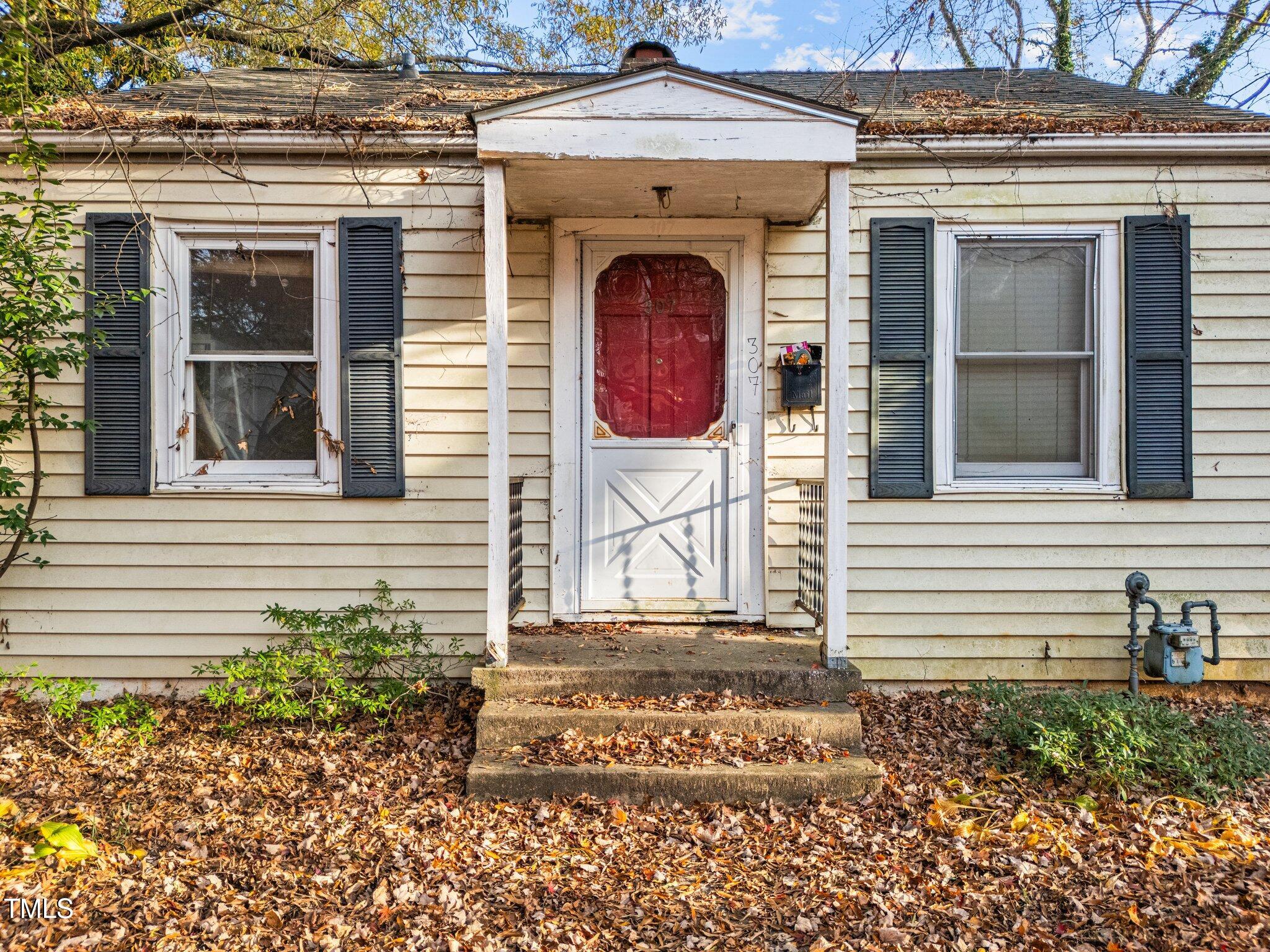 307 Bickett Boulevard Raleigh, NC 27608 - Photo 5 of 11 5-web-or-mls-DJI_20241204151954_0081_D