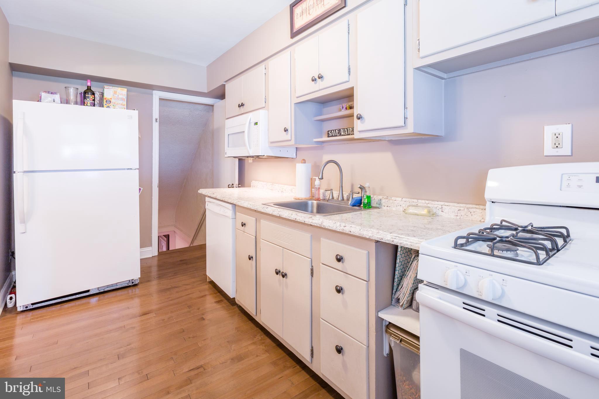 412 Scarsdale Road Baltimore, MD 21224 - Photo 11 of 31 Kitchen with Hardwood Floors
