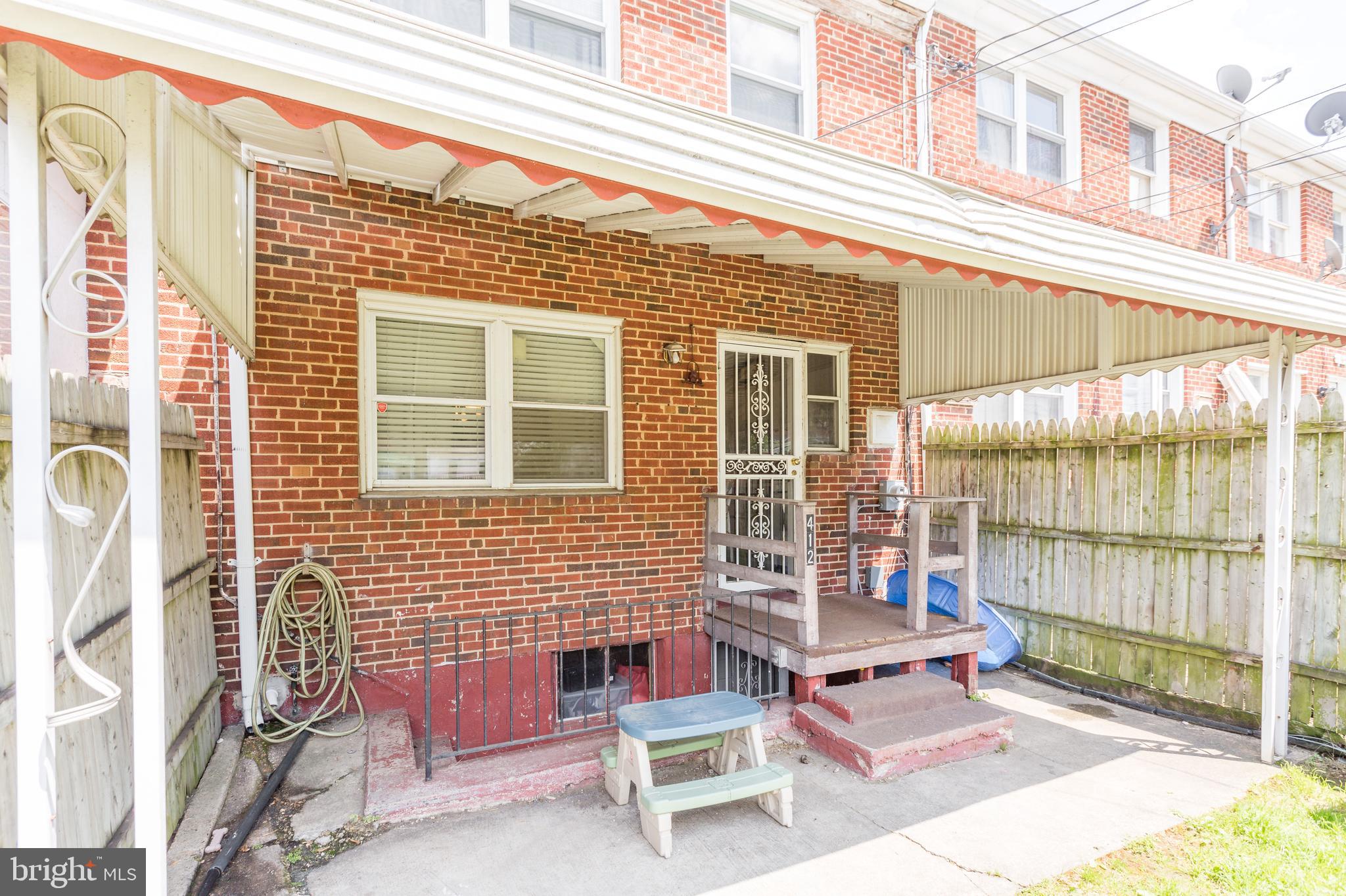 412 Scarsdale Road Baltimore, MD 21224 - Photo 30 of 31 Backyard with covered patio