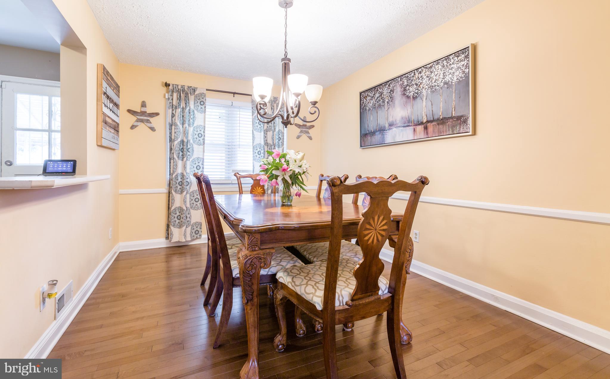412 Scarsdale Road Baltimore, MD 21224 - Photo 8 of 31 Dining Room with HardwoodFloors