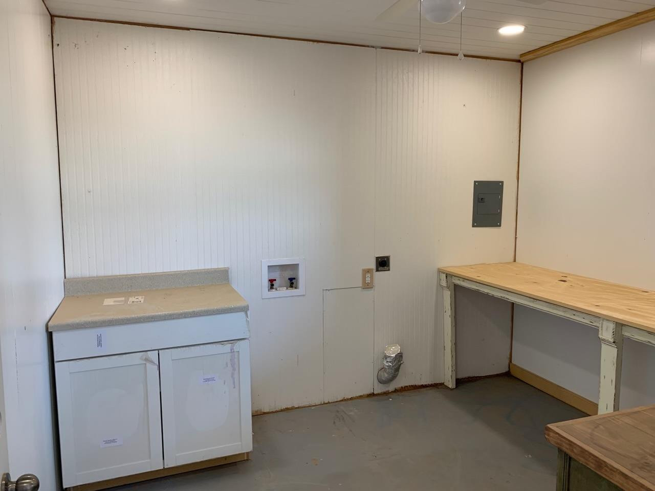 1114 County Road 260 Plains, TX 79355 - Photo 15 of 20 a room with cabinets and sink