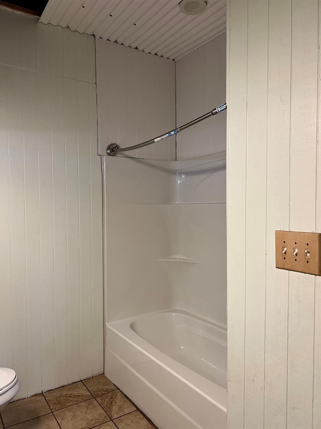 1114 County Road 260 Plains, TX 79355 - Photo 19 of 20 a bathroom with a bathtub