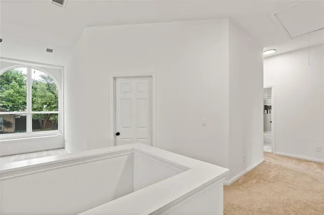 a white bath tub sitting in a bathroom