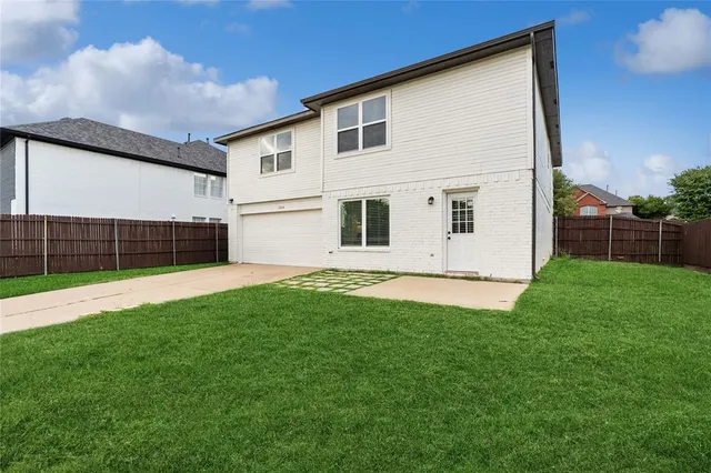 a view of backyard of house with oven