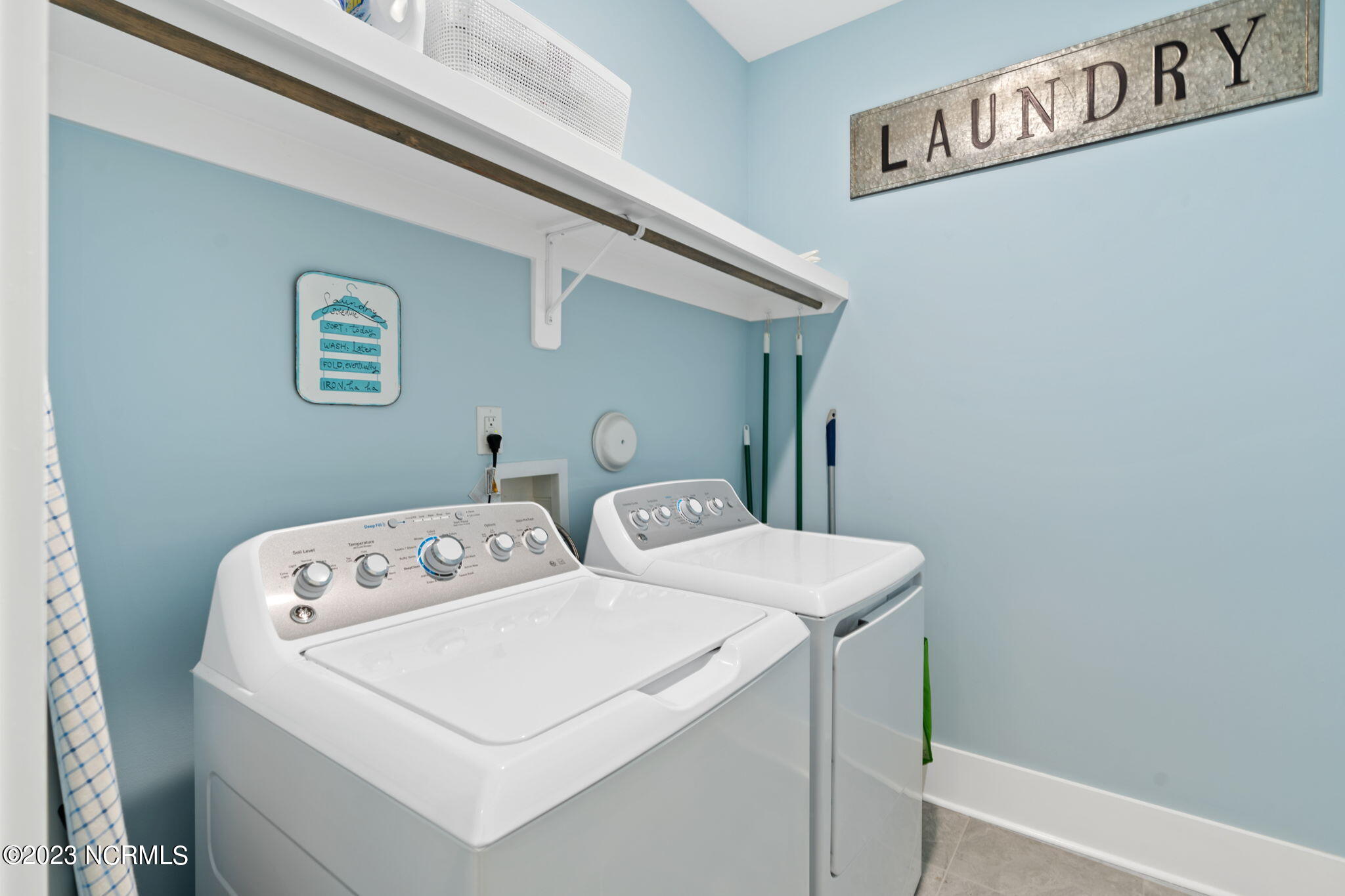 1423 Long Pond Road Southwest Ocean Isle Beach, NC 28469 - Photo 33 of 57 Laundry room with door