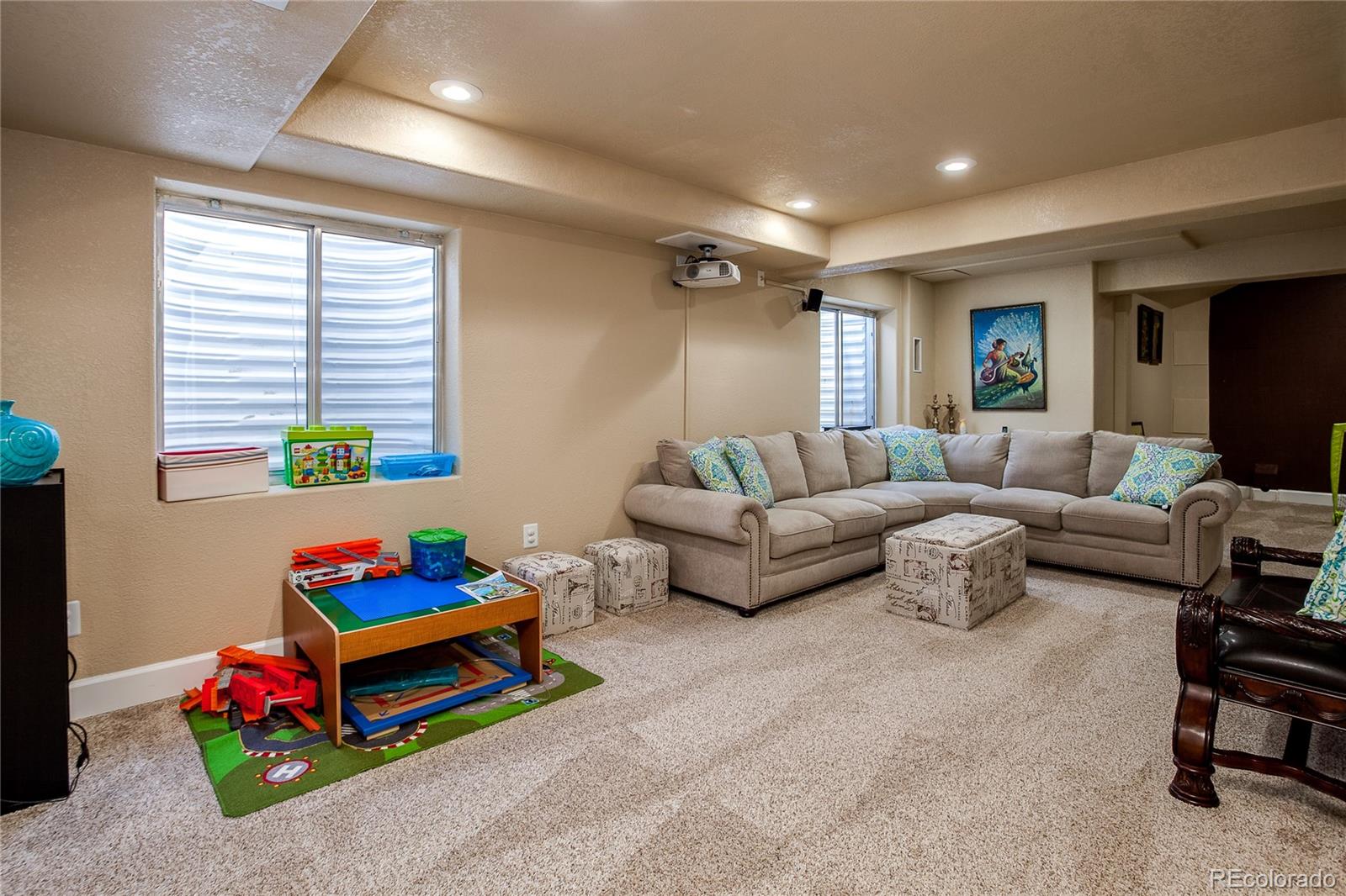 10839 Brooklawn Road Highlands Ranch, CO 80130 - Photo 16 of 32 a living room with furniture and a window
