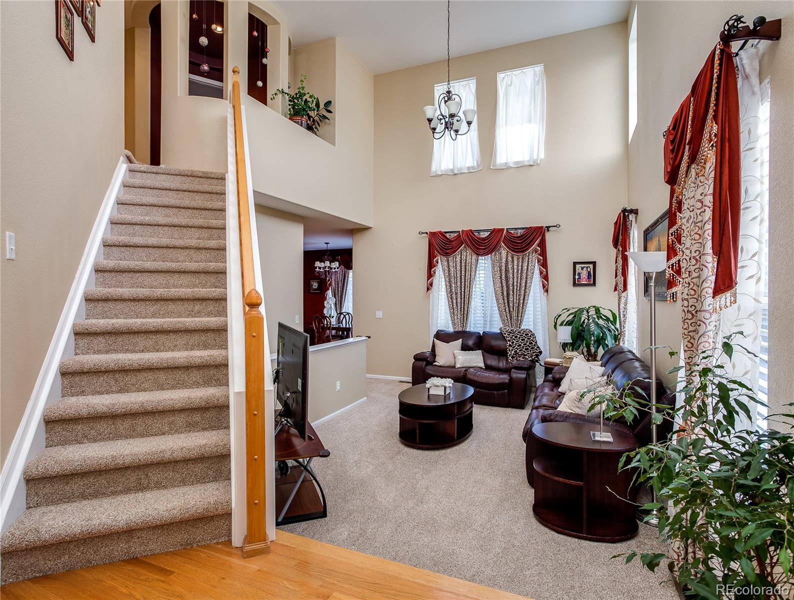 10839 Brooklawn Road Highlands Ranch, CO 80130 - Photo 2 of 32 a view of a living room with furniture