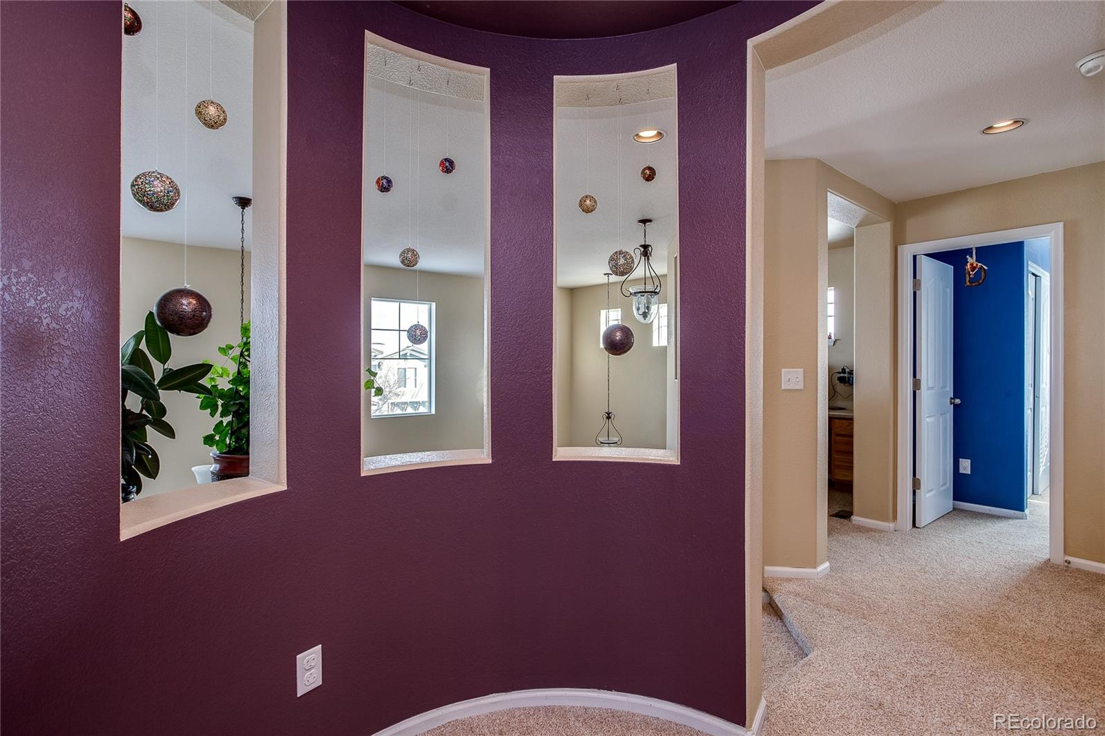 10839 Brooklawn Road Highlands Ranch, CO 80130 - Photo 28 of 32 a bathroom with a toilet a sink and mirror