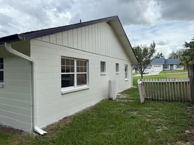 a house view with a garden space
