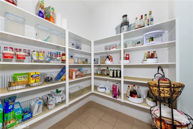 a utility room with sink dryer and washer