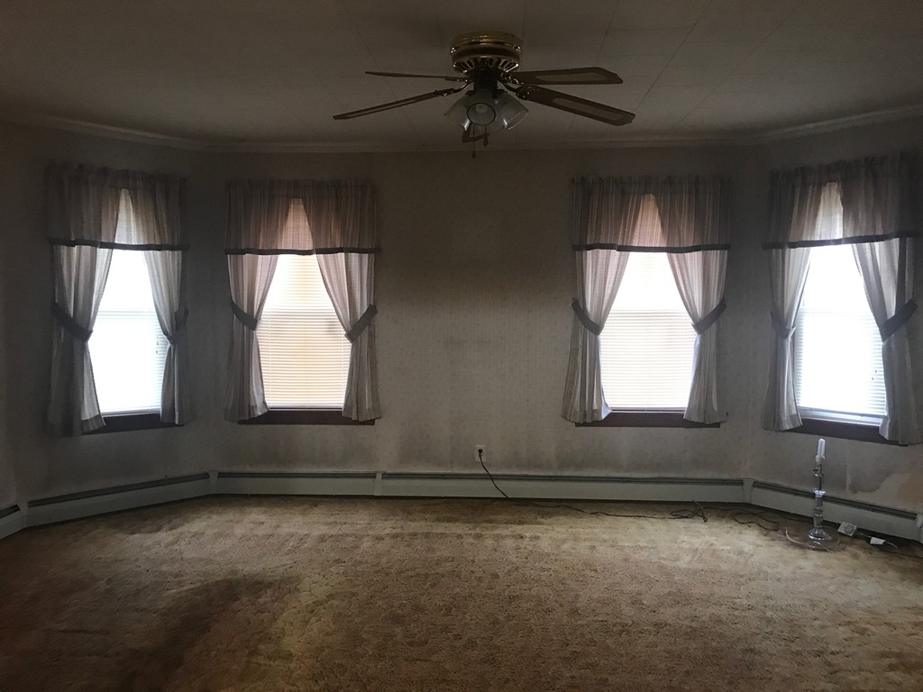 70 Hambly Street Fall River, MA 02721 - Photo 13 of 21 an empty room with windows