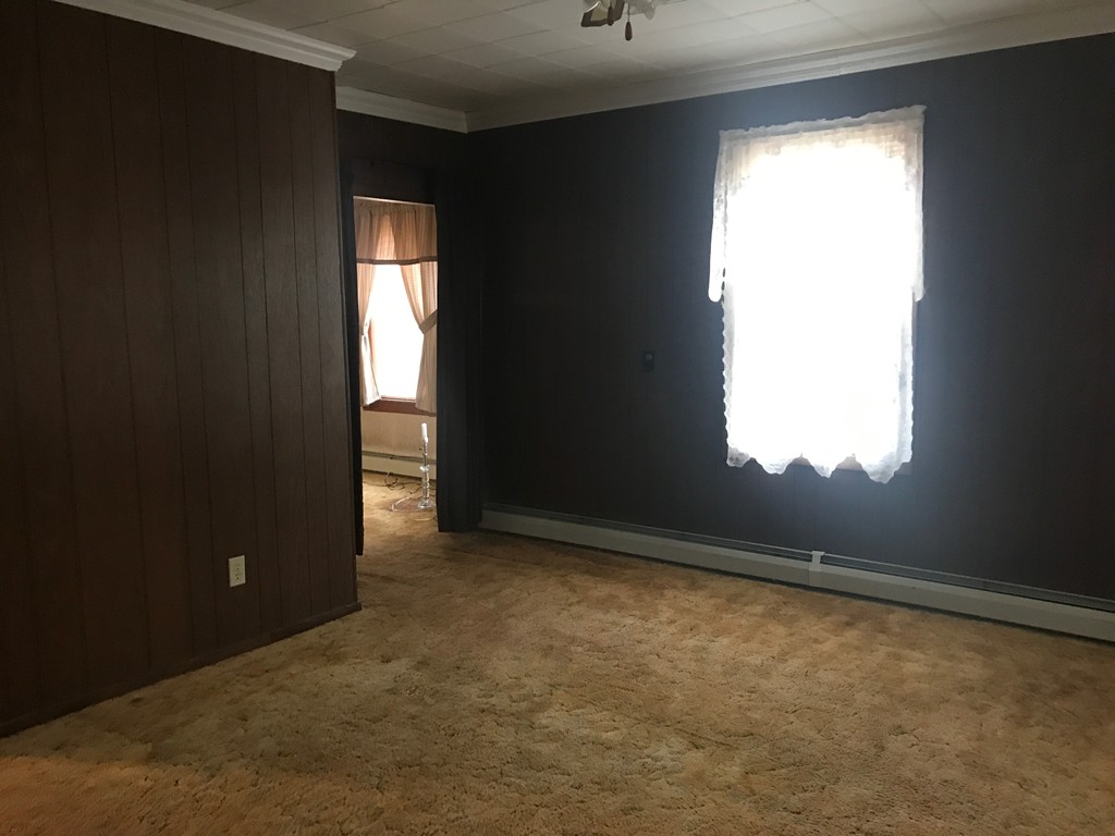 70 Hambly Street Fall River, MA 02721 - Photo 14 of 21 an empty room with window