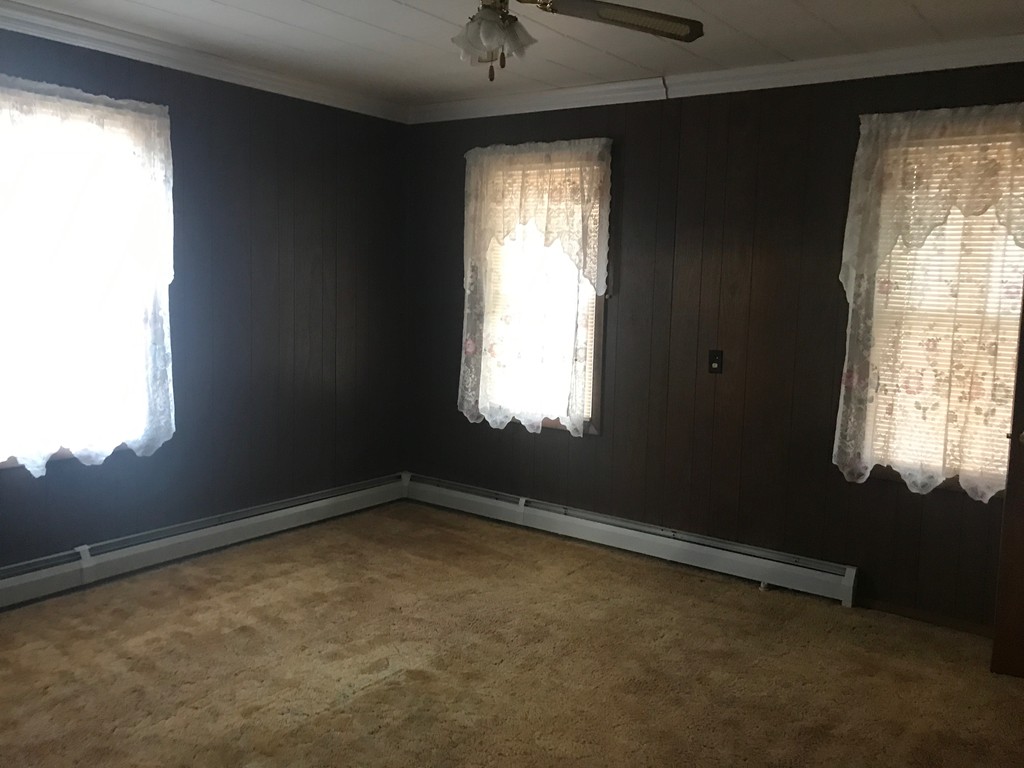 70 Hambly Street Fall River, MA 02721 - Photo 15 of 21 a view of an empty room with a window