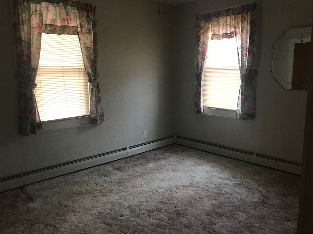 70 Hambly Street Fall River, MA 02721 - Photo 20 of 21 a view of an empty room and window