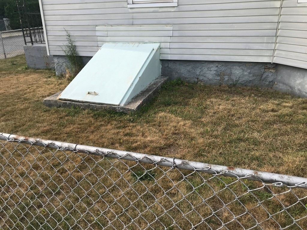 70 Hambly Street Fall River, MA 02721 - Photo 4 of 21 a view of a backyard