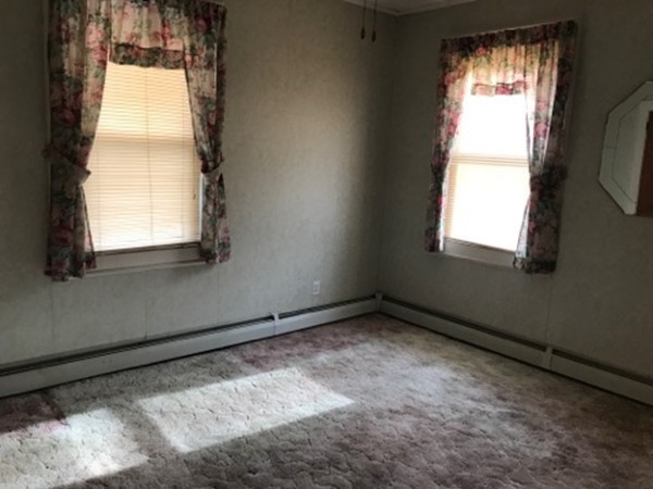 70 Hambly Street Fall River, MA 02721 - Photo 7 of 21 a view of an empty room with a window