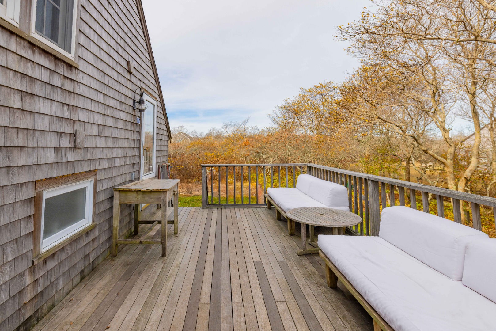 20 Lyons Lane Nantucket, MA 02554 - Photo 14 of 21 a view of a balcony with wooden floor and outdoor seating