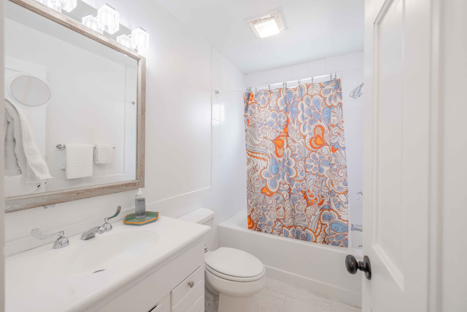 20 Lyons Lane Nantucket, MA 02554 - Photo 18 of 21 a bathroom with a sink a toilet and shower curtain