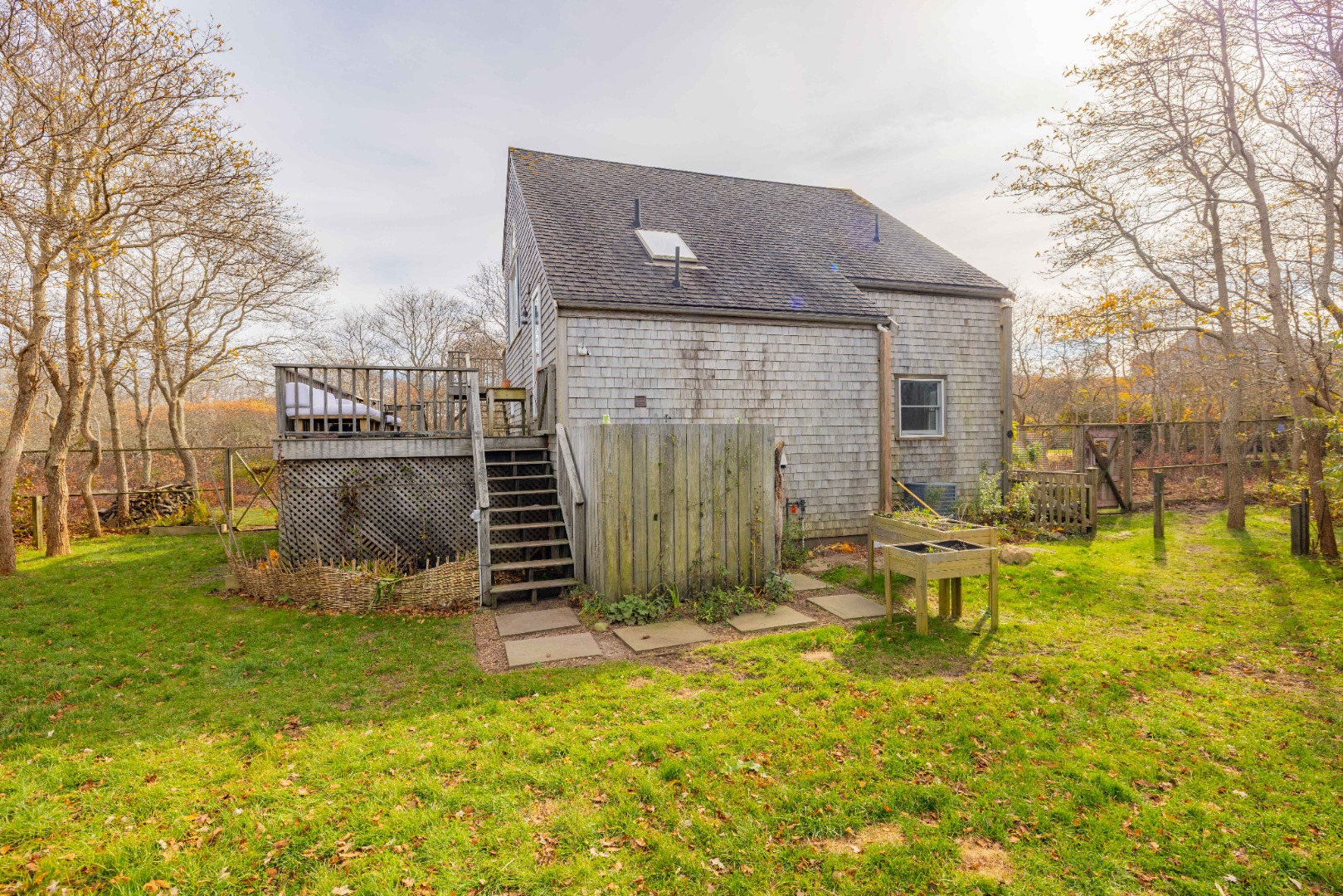 20 Lyons Lane Nantucket, MA 02554 - Photo 19 of 21 a front view of house with a garden