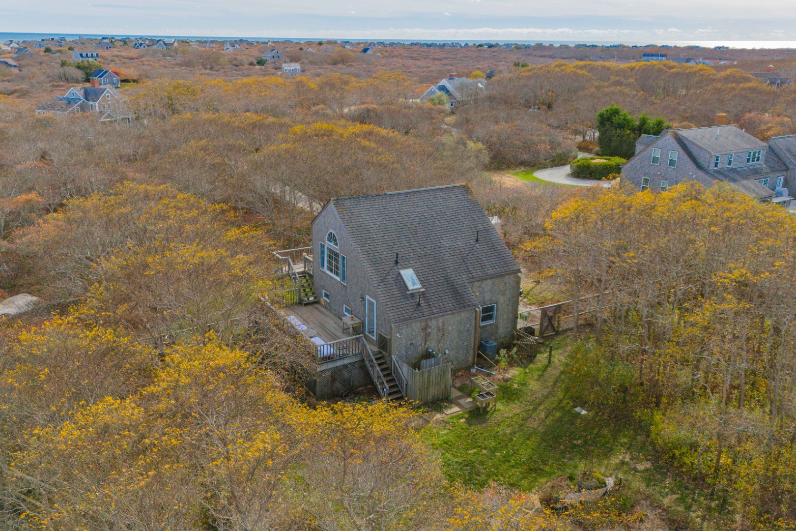 20 Lyons Lane Nantucket, MA 02554 - Photo 4 of 21 an aerial view of residential houses with outdoor space
