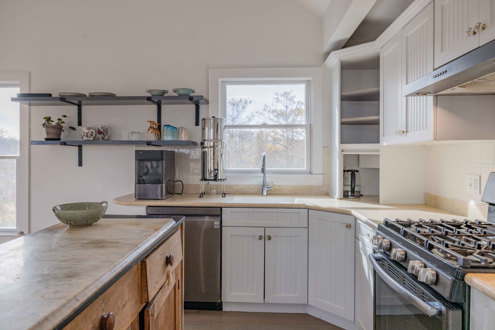 20 Lyons Lane Nantucket, MA 02554 - Photo 9 of 21 a kitchen with a sink stove and cabinets
