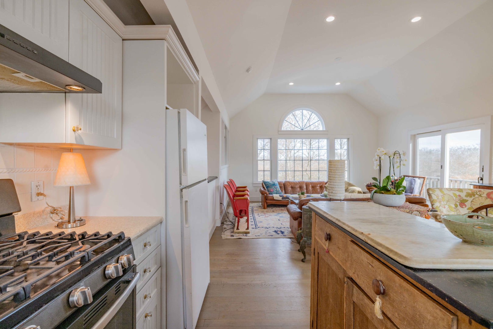 20 Lyons Lane Nantucket, MA 02554 - Photo 10 of 21 a kitchen with lots of counter top space and wooden floor