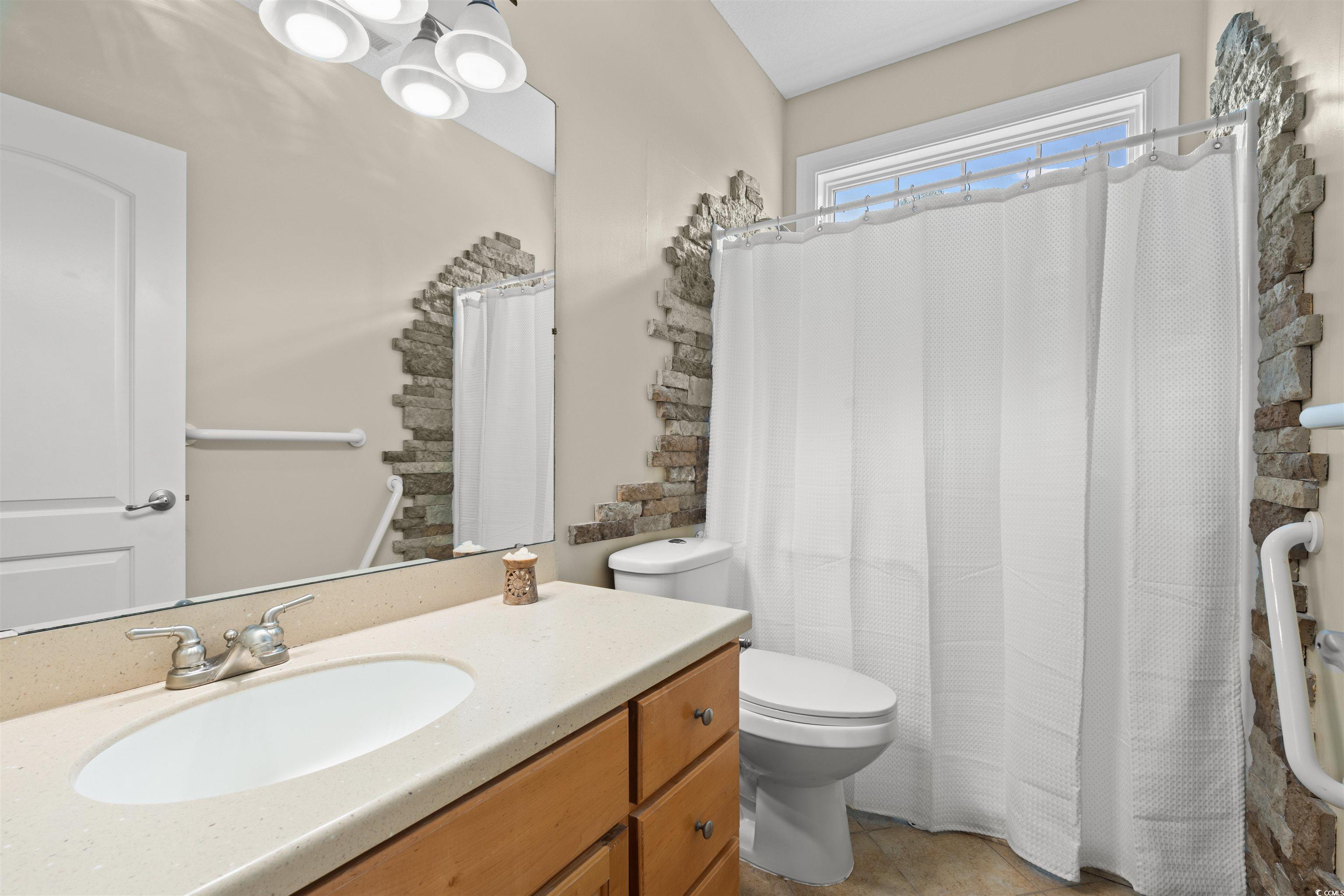 109 Eden Court Murrells Inlet, SC 29576 - Photo 14 of 31 Full bathroom with vanity and a shower with curtain