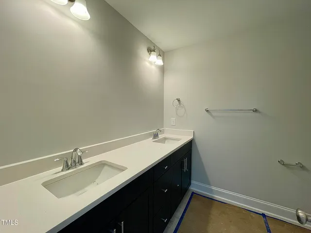 a picture of wall with a bathroom
