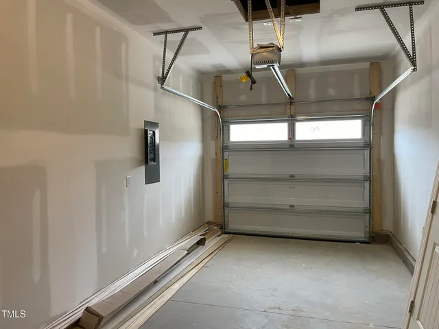 a view of a patio with chairs and tables