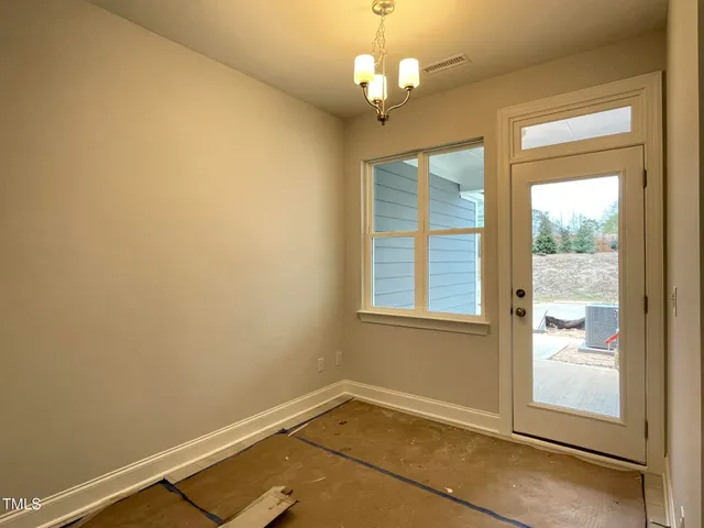 a bathroom with a sink and vanity