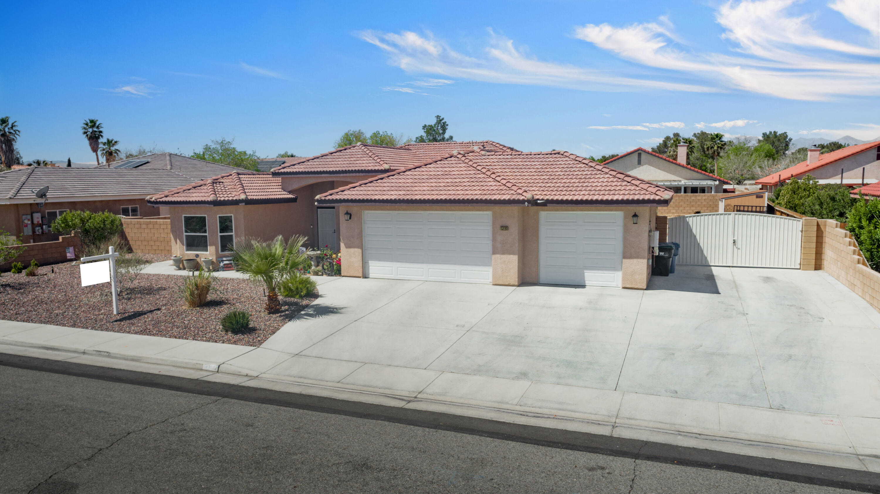 1231 Carolyn Street Ridgecrest, CA 93555 - Photo 3 of 49 a front view of a house with porch