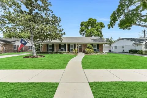 a view of outdoor space yard and front view of a house