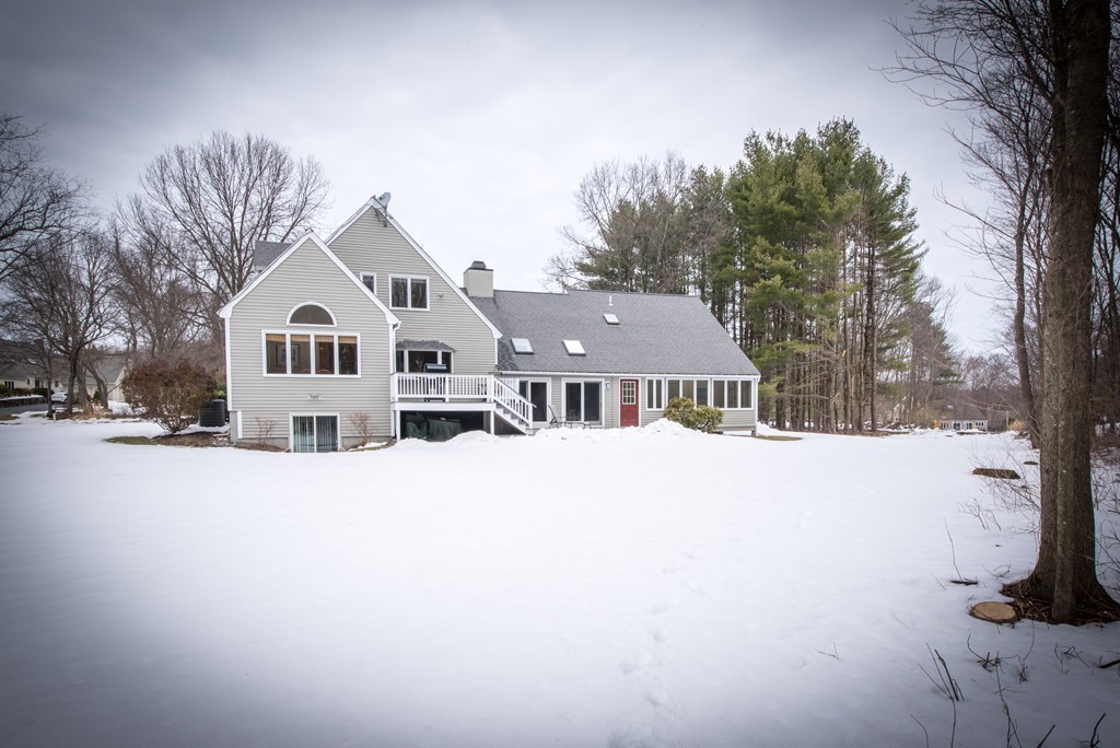 6 Garvey Road Framingham, MA 01701 - Photo 3 of 30 a house with a outdoor space covered with snow in front of house