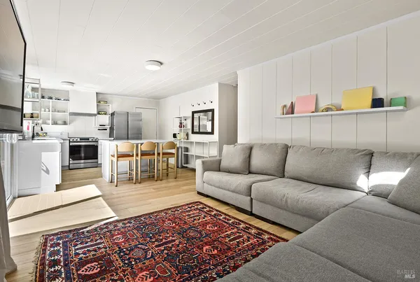 a living room with furniture and a couch