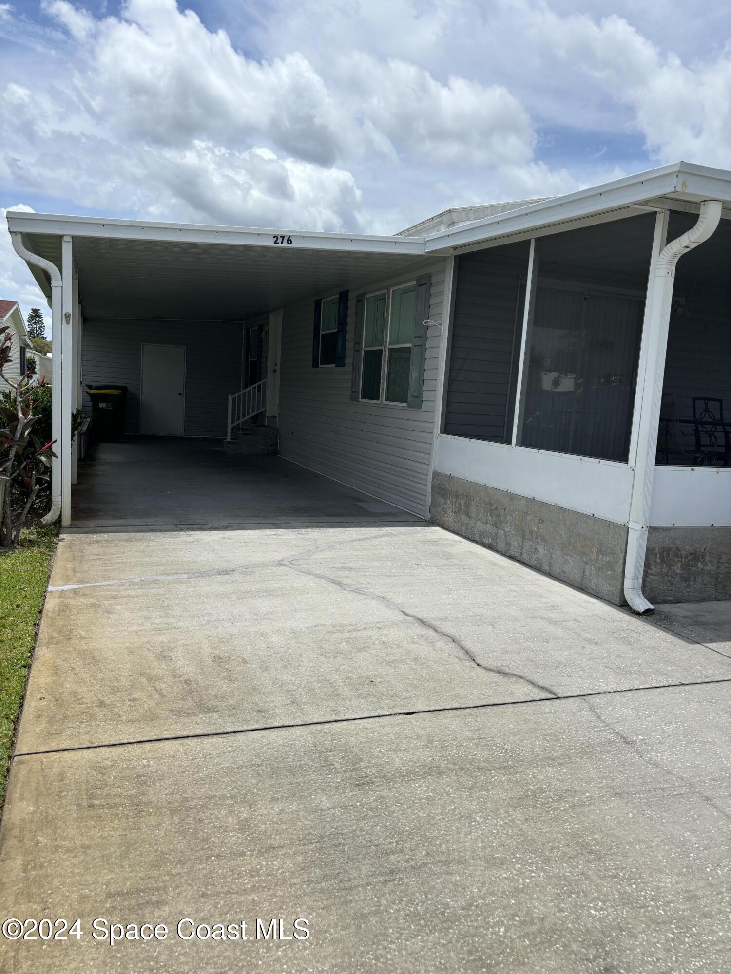 276 Timber Run Way Cocoa, FL 32926 - Photo 2 of 18 a view of house with an outdoor space
