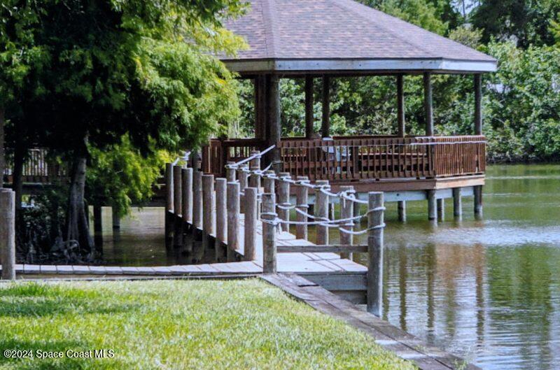 276 Timber Run Way Cocoa, FL 32926 - Photo 9 of 18 a view of a house with backyard and porch