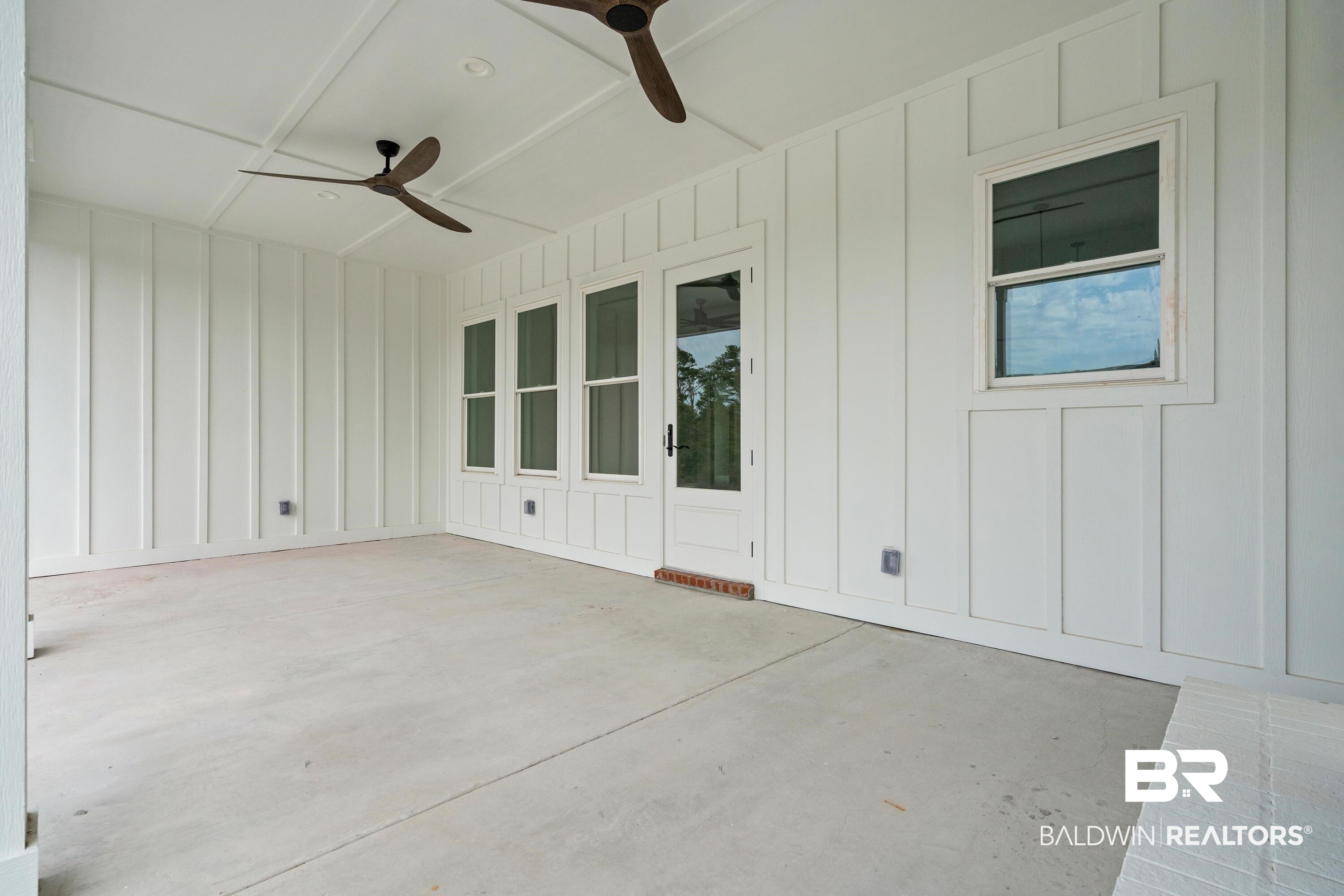 30650 Ono N Loop West Orange Beach, AL 36561 - Photo 6 of 38 View of patio / terrace with ceiling fan